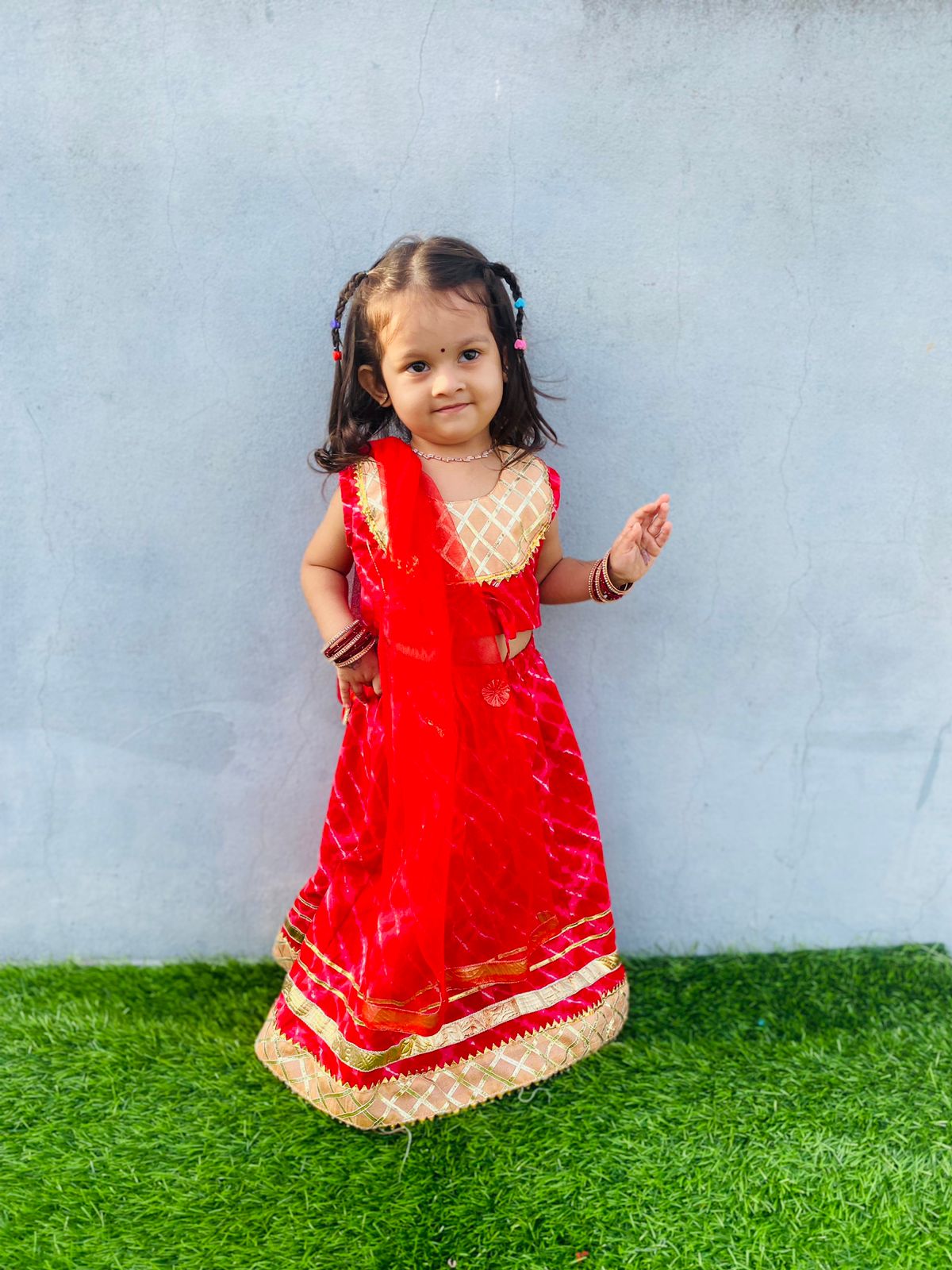 Red and golden colour lehenga top