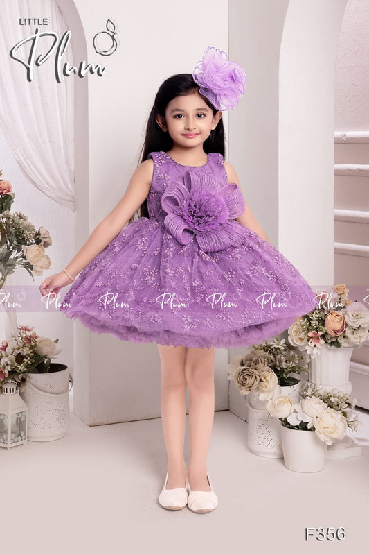 Sleevless Purple color dress for girls with big flower on the waist