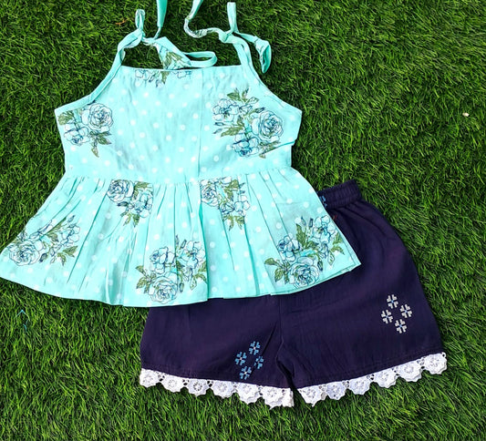 Serenity in Blue: Girls' Sky-Color Top and Blue Shorts Ensemble